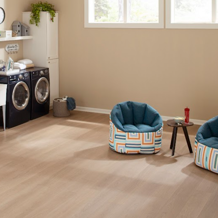 Bright Laundry room with waterproof Mohawk Flooring